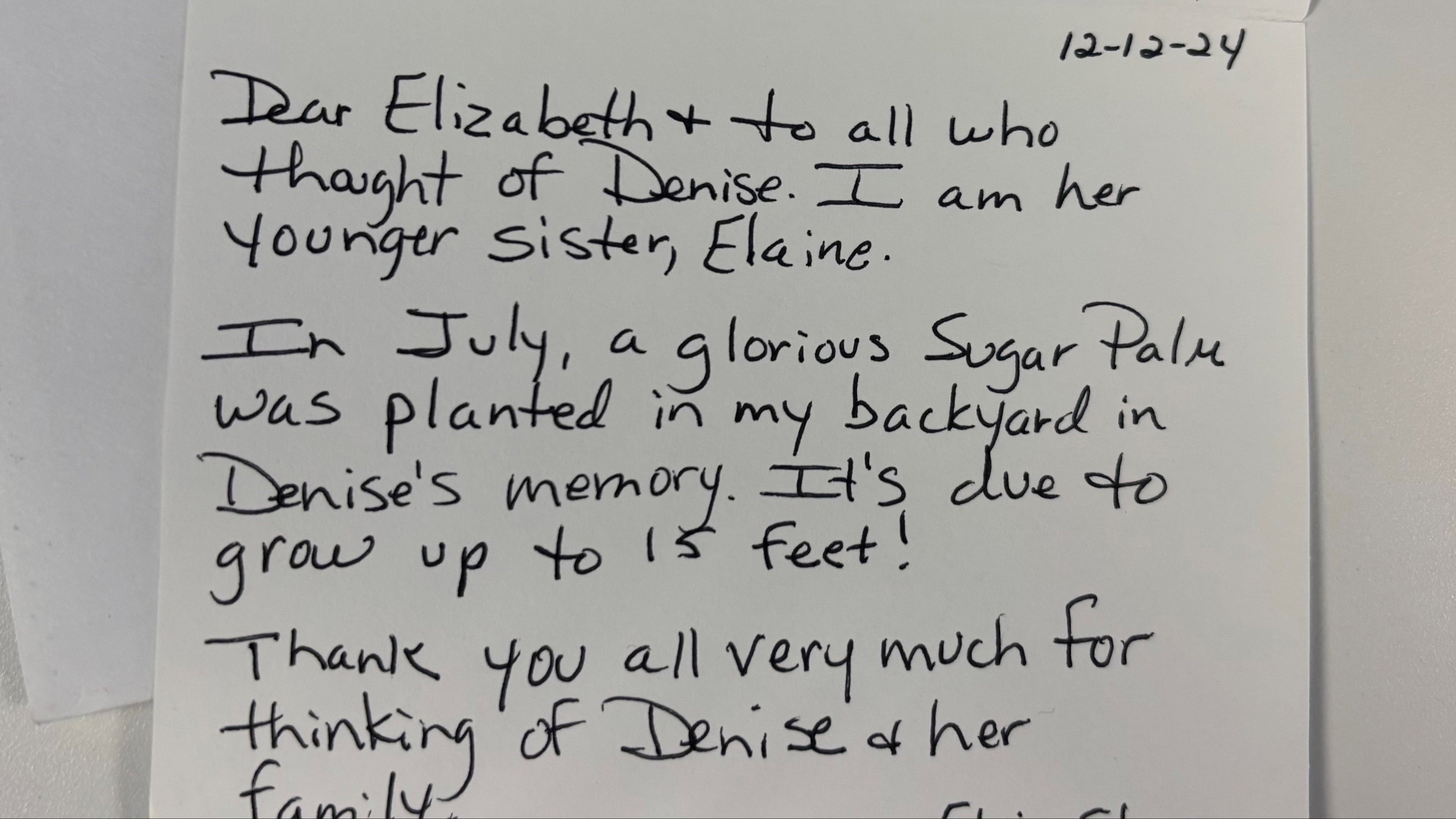 Handwritten letter on a white background expressing heartfelt thanks for their memorial tree gift.